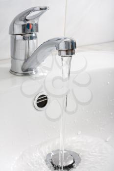 Royalty Free Photo of a Running Faucet