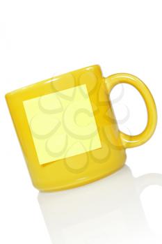 Royalty Free Photo of a Mug With a Note On It