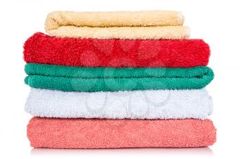 Colorful bath towels over a white background