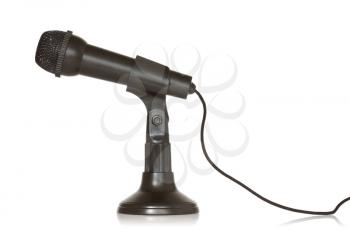 Black dynamic microphone on a white background 