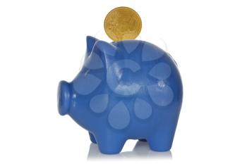 Blue piggy bank with fifty eurocents on a white background