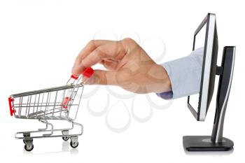 	e-commerce concept. hand reaches out of a computer monitor with a shopping cart