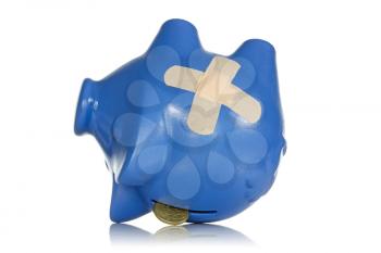 Financial losses concept. Injured piggy bank on  white background