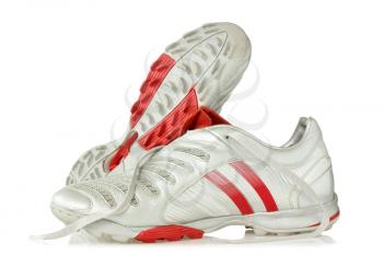 Football boots  with reflection on white background