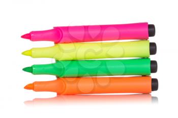 four colorful highlighter pens isolated on white background