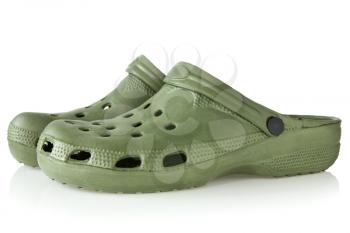 green rubber sandals with reflection on white background