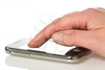 hand with smart phone over a white background 
