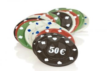 pile of poker chips on white background