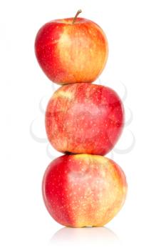 Three red apples one on another.Isolated on white background
