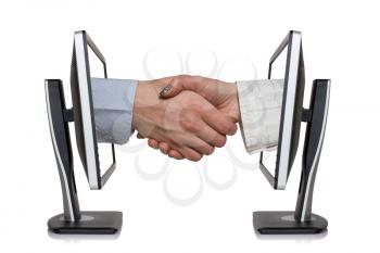 Two computer monitors and hands in handshaking, internet working concept, wireless communication, on-line business 