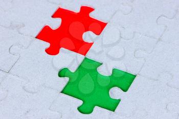 Jigsaw puzzle with a green and red gap