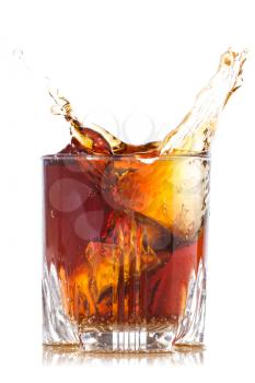 Splash of brown beverage, isolated on white background