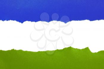 Torn blue and green paper with space for text on white background