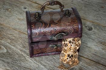 Wooden chest with a pirate's gold inside