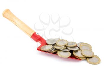 Royalty Free Photo of a Shovel Filled With Coins
