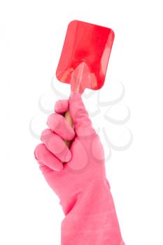 Royalty Free Photo of a Rubber Glove Holding a Shovel