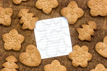 Royalty Free Photo of Cookies and a Paper