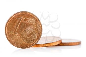 Bronze Euro Cent coins with reflection on white background