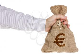 Hand giving a money bag with Euro symbol. Isolated on white background