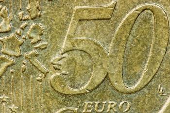 Close-up of an uncirculated fifty euro cents coin 
