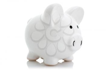 White piggy bank with reflection on white background