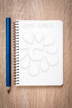 	Notebook with pencil and goals of year 2015