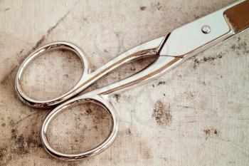 Old metal scissors, intentionally shot in vintage tone. 