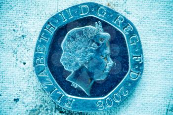 Fifty pence on canvas background in blue tone