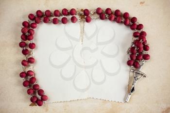Catholic rosary and two empty cards with copy-space