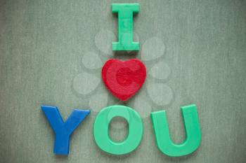 I love you text on green paper background
