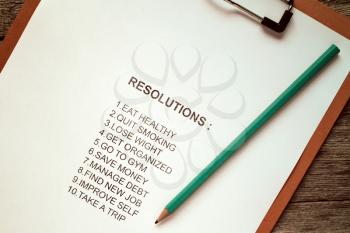 Clipboard with list of resolutions for new year