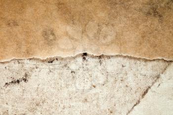Old paper and dirty canvas - perfect background with copy-space