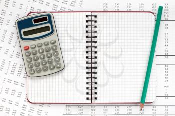 Calculator and spiral notebook on financial statement , concept of accounts.