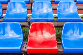 Red seat in blue seats on the stadium