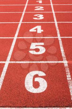 Stadium running track with the numbers from one to six