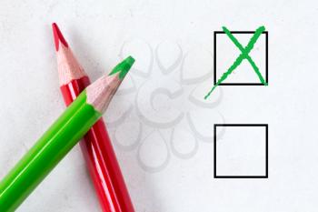 Green and red pencils with marking checkbox. Concept for customer satisfaction survey,education research or election
