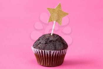 Mini chocolate cupcake with star on stick