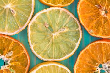   Citrus fruit background with sliced orange and lemon