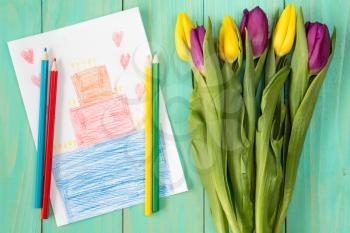 Handmade birthday greeting card and bouquet of tulips