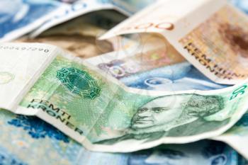 Norwegian paper money in a pile closeup photo