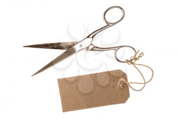 Metal scissors with blank tag,isolated on white background