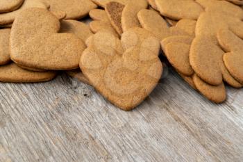 Pile of gingerbread cookies in a heart shape