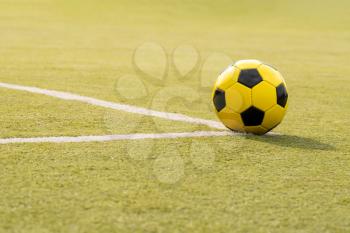  Soccer ball with line on artificial green turf soccer field