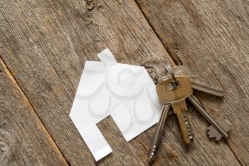 House icon and keys. Concept for real estate or renting home.