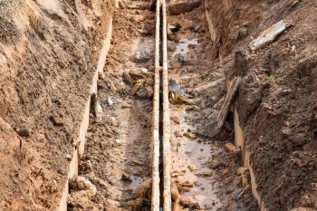 Trench for laying of engineering heating systems