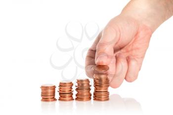 Hand put coin to money staircase.Making money. Business and finance concept.