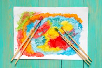 Watercolor brushes and abstract watercolor painting