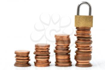 Golden padlock on the stack of coins.Saving and financial security concept.