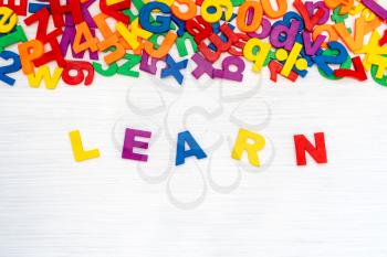 Learn word made by colorful plastic letters