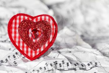 Red heart with music notes, conceptual image